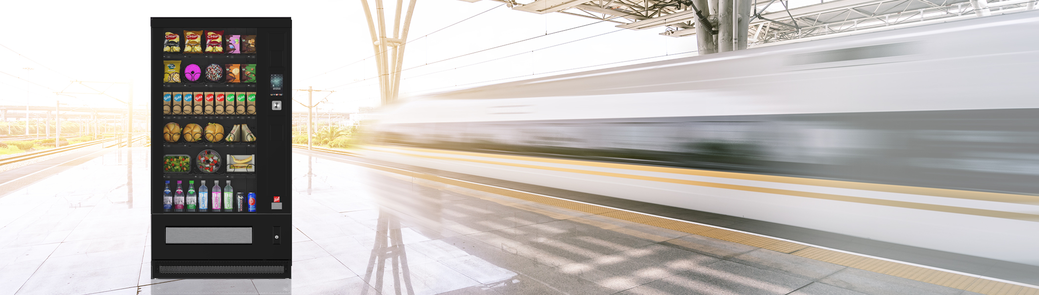 SiLine<sup>®</sup> Snack und Combi Auf einem Bahnsteig stehender SiLine Snack- und Kombiautomat.
